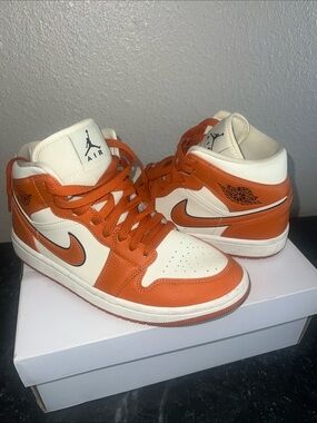 Nike Air Jordan mid Orange and White Mid-Top Sneakers with Swoosh